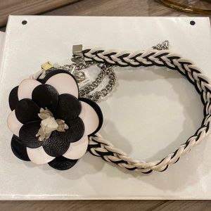 Gently used black and white flower belt